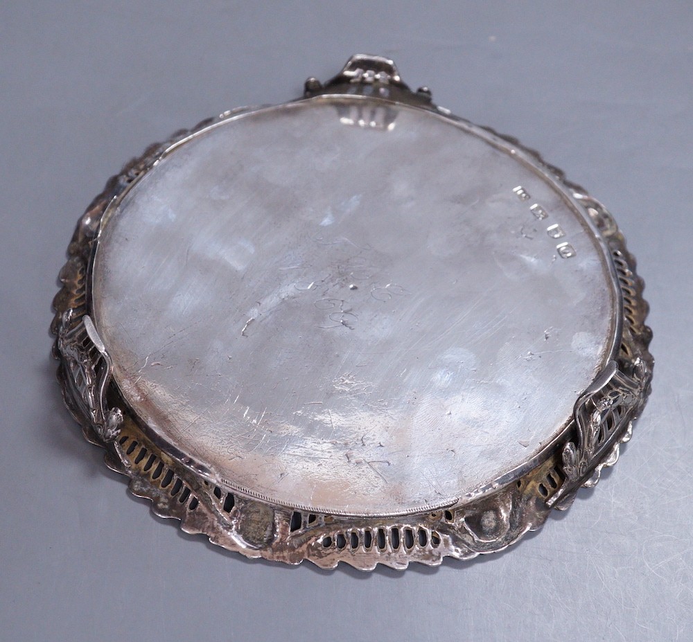 A George III silver waiter with applied pierced silver border, John Cox, London, 1771, 18.1cm, 11.9oz, with later engraved initials and date to the base, (a.f.).